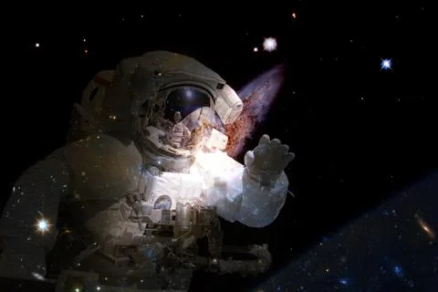 Astronaut in deep space. Elements of this image furnished by NASA Foto stock
