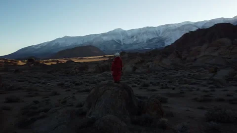 Astronaut Explores Shadowed Terrain Video stock 270398170