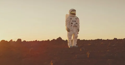 Astronaut exploring Mars Stock Footage 127692418