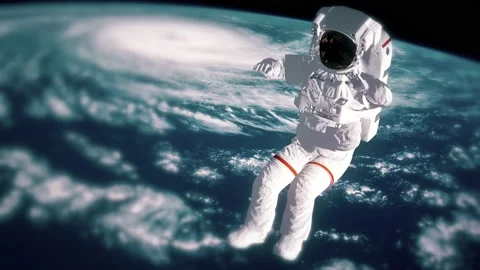 Astronaut falls to Earth in the open space. Spacewalk. Earth with a Hurricane Stock Footage 130201436