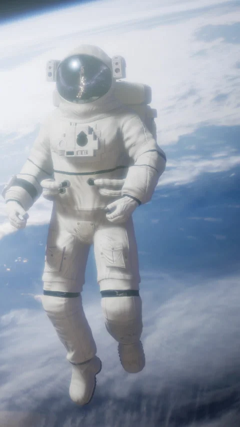 Astronaut floating in space near Earth with clouds below Stock Footage 344960591