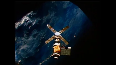 Astronaut floats in space rocket - 1973 Stock Footage 94383027