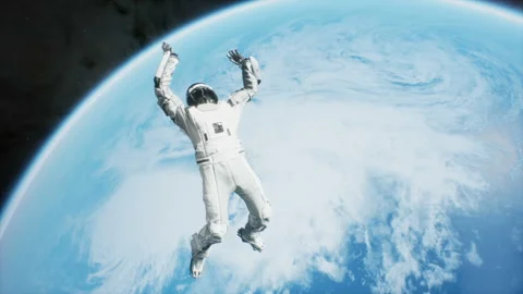 An astronaut is flying in outer space and falls on an unknown blue planet Stock Footage 138404106