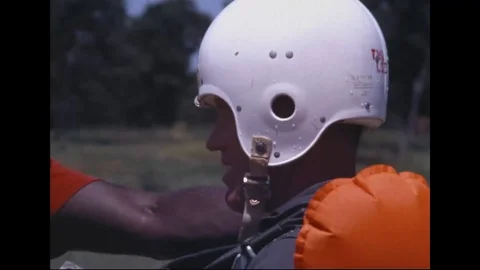 Astronaut getting ready for parasail training - 1968 Stock Footage 104331179