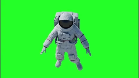 An astronaut on a green background Stock Footage 83594339