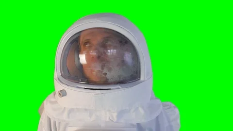 The astronaut on a green background Stock Footage 109272056