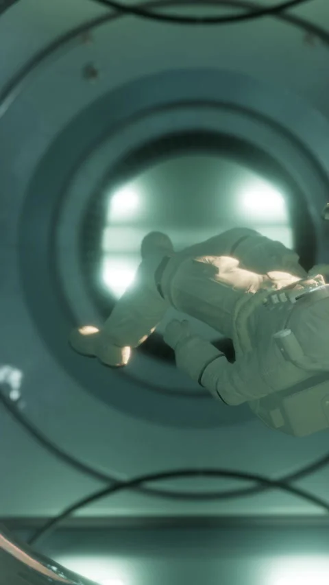 Astronaut inside a spacecraft during a space mission in low gravity Stock Footage 344962918