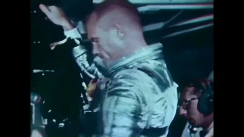 Astronaut John Glenn eats, has medical sensors attached to his body, suits up 動画素材 88552526