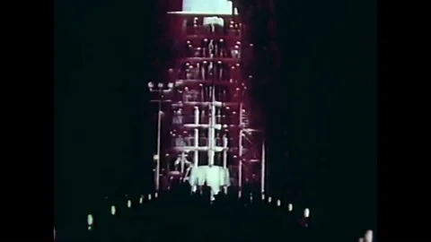 Astronaut John Glenn eats, has medical sensors attached to his body, suits up Stock Footage 88552531
