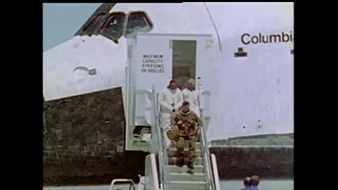 Astronaut John Young descending steps from Space Shuttle Colombia STS-1 Stock Footage 270937042
