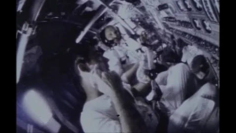 Astronaut John Young shaving during spaceflight aboard Apollo 10 Stock Footage 270937598