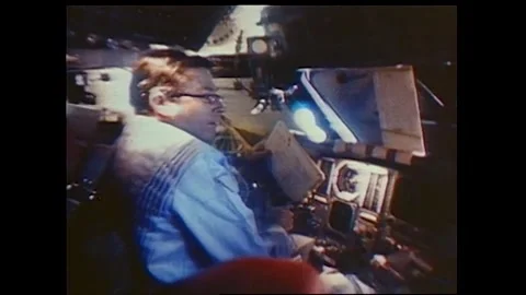 Astronaut John Young working aboard Space Shuttle Colombia STS-1 Stock Footage 270937312