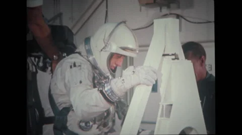 Astronaut leaving spacecraft couch Stock Footage 37597074