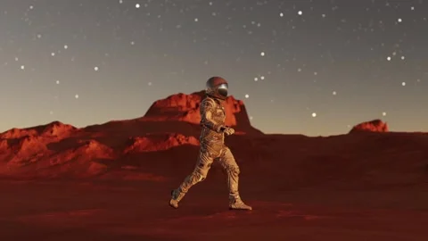 Astronaut on Mars walks by on the surface Stock Footage 270460348