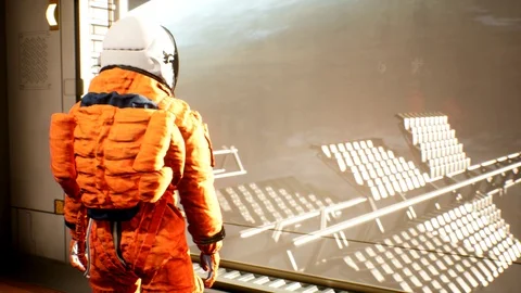 Astronaut marvels at the galaxy from advanced space station Stock Footage 119999364