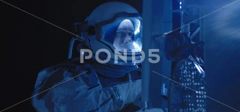 Astronaut on the Moon looking around Stock Photos