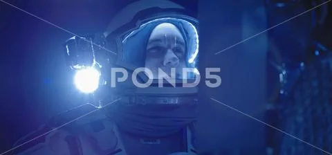 Astronaut on the Moon looking around Stock Photos