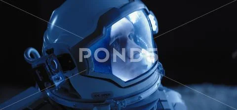 Astronaut on the Moon looking around Stock Photos