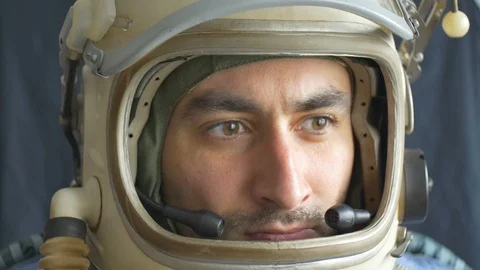 Astronaut Opens Helmet Window Stock Footage 122757690