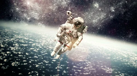 Astronaut in outer space against the backdrop of the planet earth. Stock Footage 47069717
