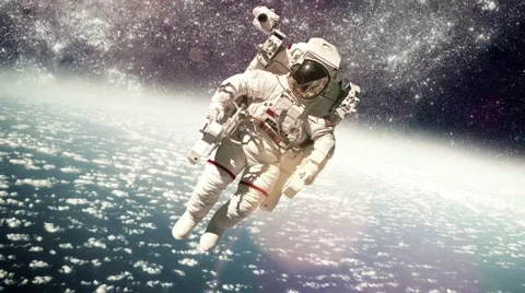 Astronaut in outer space against the backdrop of the planet earth. Elements o Stock Footage 61168200