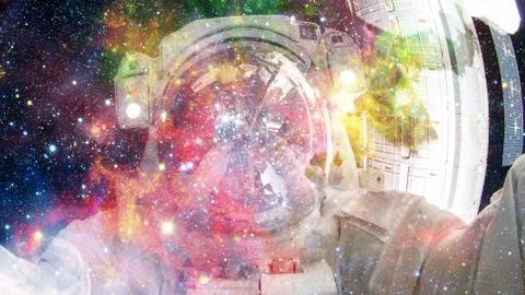 Astronaut in outer space. Elements of this image furnished by NASA. Stock Photos