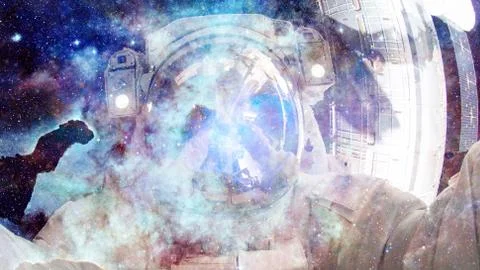 Astronaut in outer space. Elements of this image furnished by NASA. Stock Photos