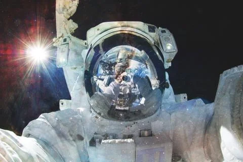 Astronaut in outer space. Elements of this image furnished by NASA Stock Photos