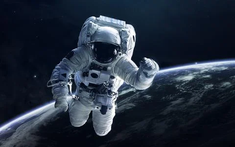 Astronaut in outer space. Elements of this image furnished by NASA Stock Photos