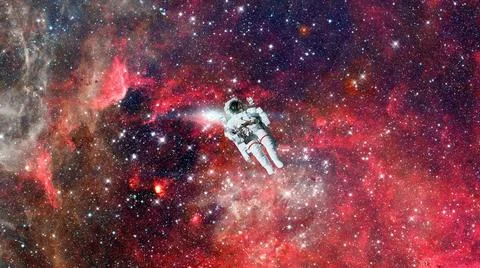 Astronaut in outer space. Elements of this image furnished by NASA. Astron... Stock Photos