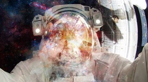 Astronaut in outer space. Elements of this image furnished by NASA. Astron... Stock Photos