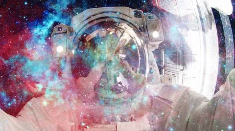 Astronaut in outer space. Elements of this image furnished by NASA. Astron... Stock Photos