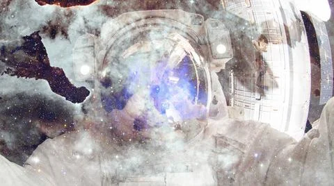 Astronaut in outer space. Elements of this image furnished by NASA. Astron... Stock Photos