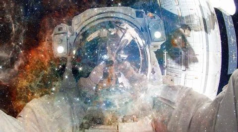 Astronaut in outer space. Elements of this image furnished by NASA. Astron... Stock Photos
