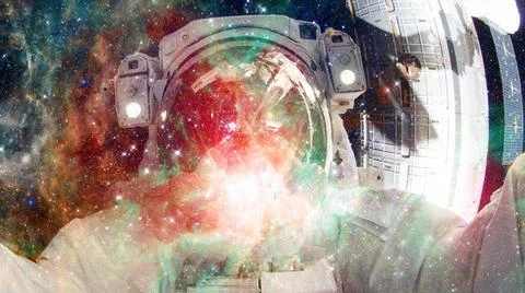Astronaut in outer space. Elements of this image furnished by NASA. Astron... Stock Photos