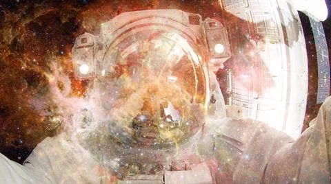 Astronaut in outer space. Elements of this image furnished by NASA. Astron... Stock Photos