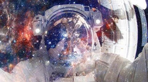 Astronaut in outer space. Elements of this image furnished by NASA. Astron... Stock Photos