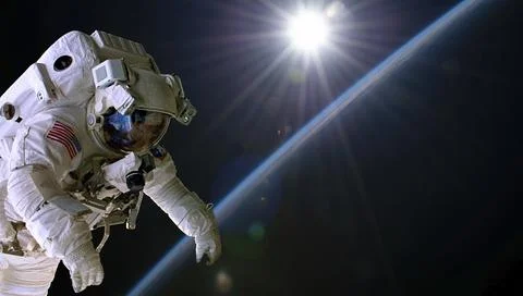 Astronaut in outer space over the planet Earth. Our home. ISS. Elements of this イラスト素材
