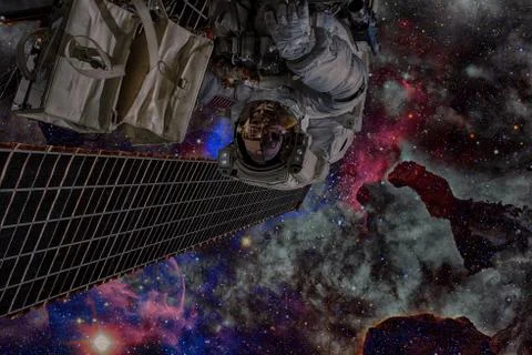 Astronaut in outer space. Spacewalk. Elements of this image furnished by NASA Stock Photos