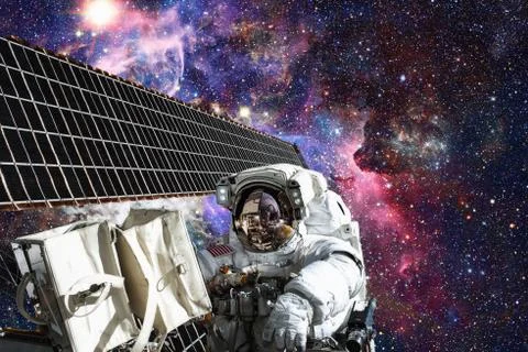 Astronaut in outer space. Spacewalk. Elements of this image furnished by NASA Stock Photos