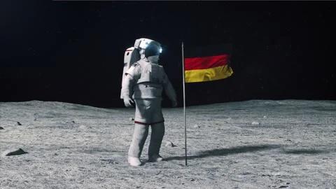 Astronaut in outer space on the surface of the moon. Planting German flag Stock Footage 168337165