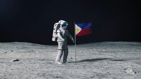 Astronaut in outer space on the surface moon. Planting Philippines Filipino flag Stock Footage 168386423