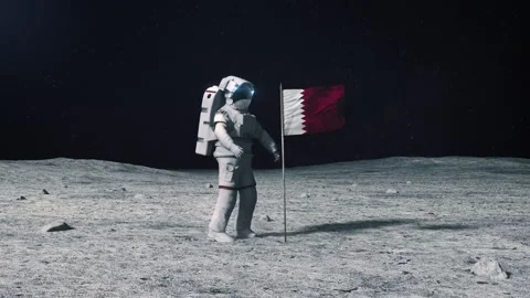 Astronaut in outer space on the surface of the moon. Planting Qatar, Qatari flag Stock Footage 168388043