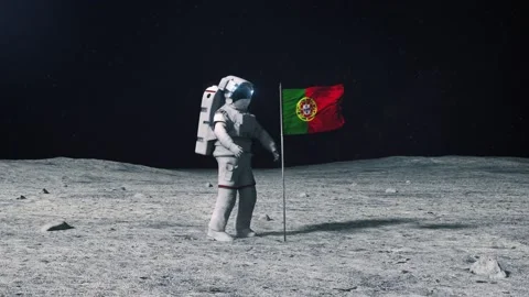Astronaut in outer space on the surface of the moon. Planting Portugal flag Video stock 168388044
