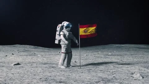 Astronaut in outer space on the surface of the moon. Planting Spain Spanish flag Stock Footage 168389803