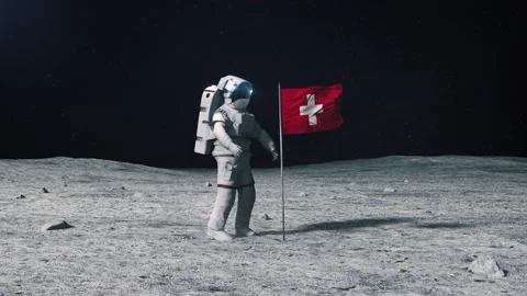 Astronaut in outer space on the surface of the moon. Planting Switzerland, Swiss Stock Footage 168389821