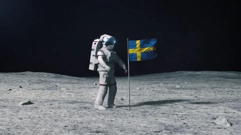 Astronaut in outer space on the surface of the moon. Planting Sweden flag 動画素材 168389827