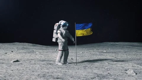 Astronaut in outer space on the surface of the moon. Planting Ukraine, Ukrainian Stock Footage 168390604