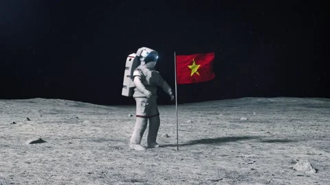 Astronaut in outer space on the surface of the moon. Planting Vietnam Vietnamese Stock Footage 168390615