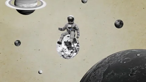 Astronaut Riding a Small Moon Among Planets on Paper Stock Footage 346783312
